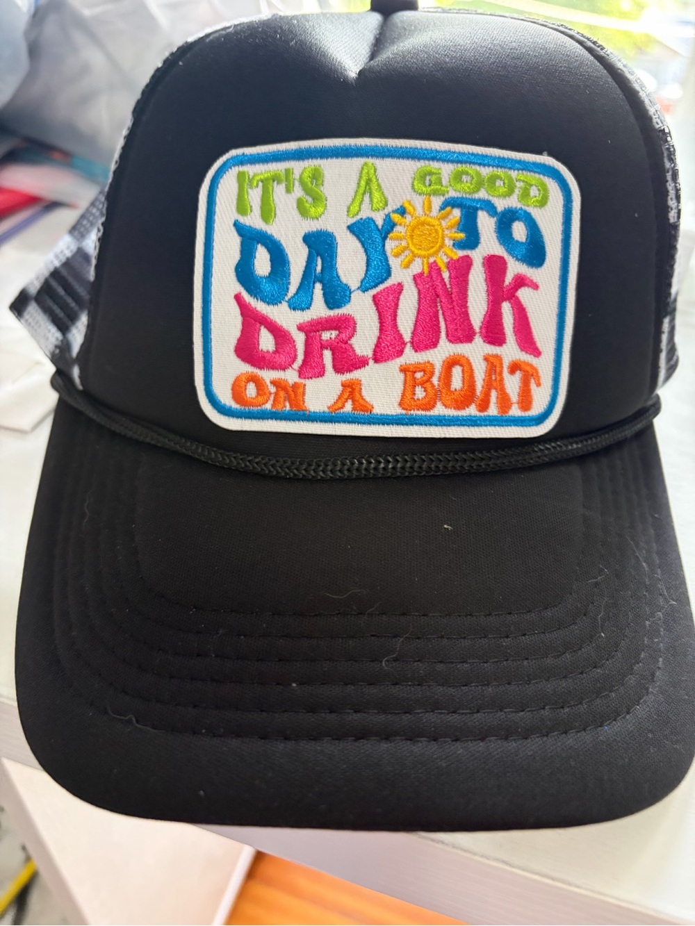 Black Trucker Hat with Colorful "It's a Good Day to Drink on a Boat" Patch